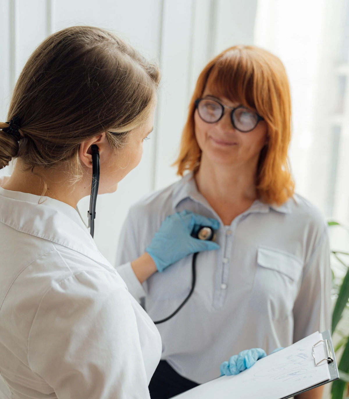 A Pristine Health APRN-CNP listening to a primary care patient during a same-day visit