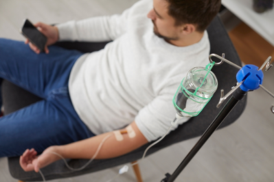 man getting iv infusion