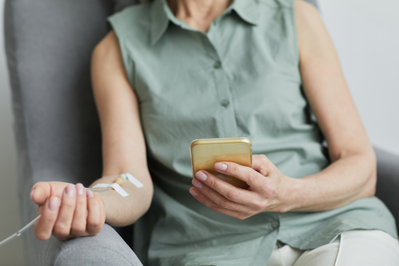 iv in woman's arm